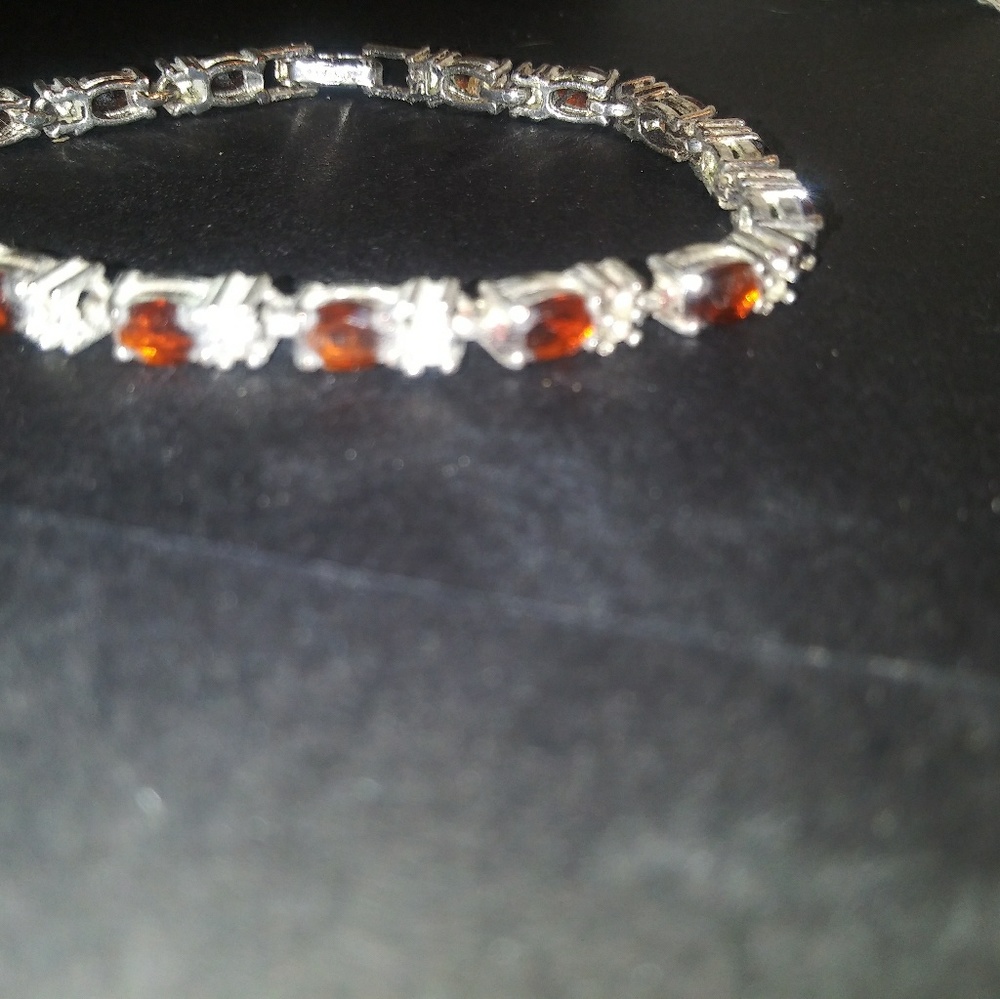Pretty garnet and silver plated braclet